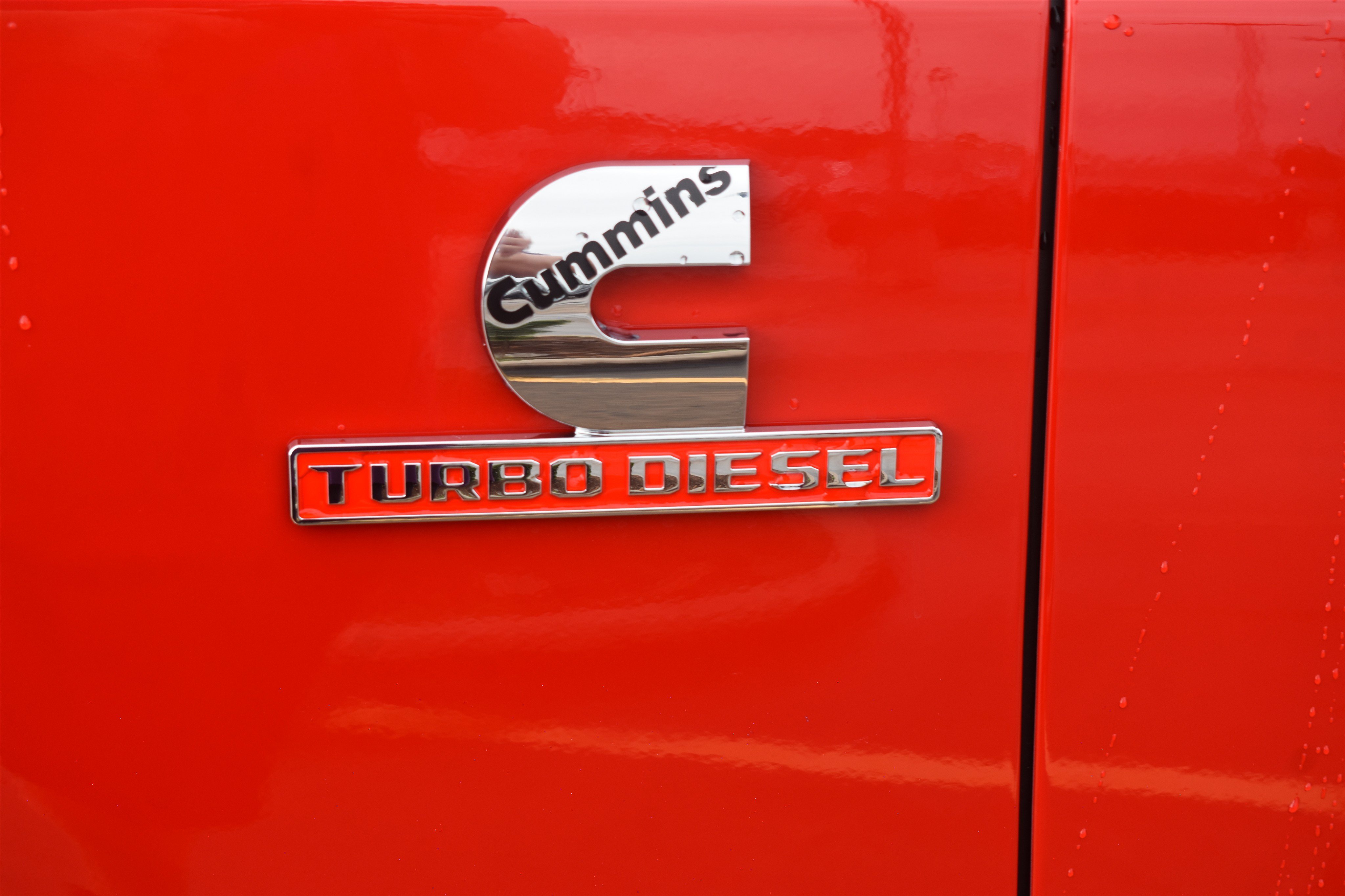 New 2026 Flame Red Clear-Coat Exterior Paint RAM Laramie image 13