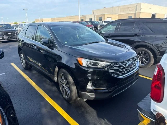 Used 2024 Black Ford Titanium image 1