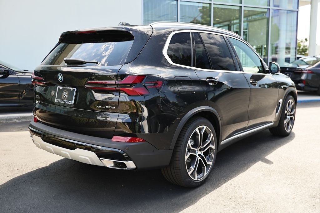 New 2026 Black Sapphire Metallic BMW xDrive50e image 7