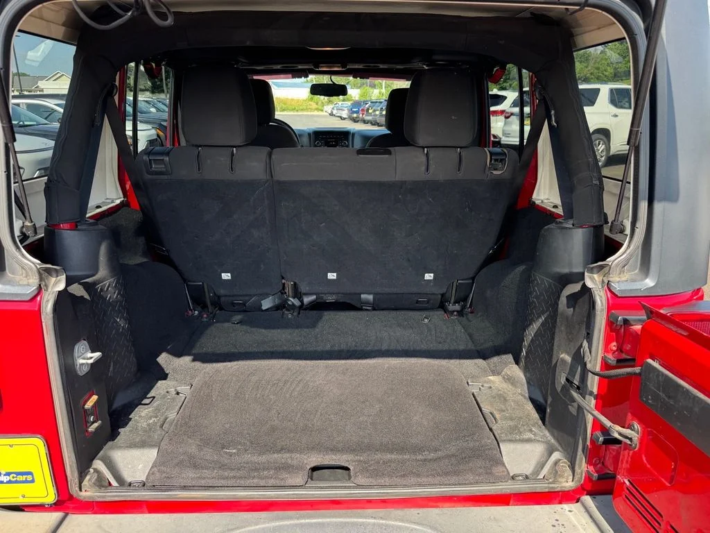 Used 2014 Red Jeep Unlimited Sport image 17
