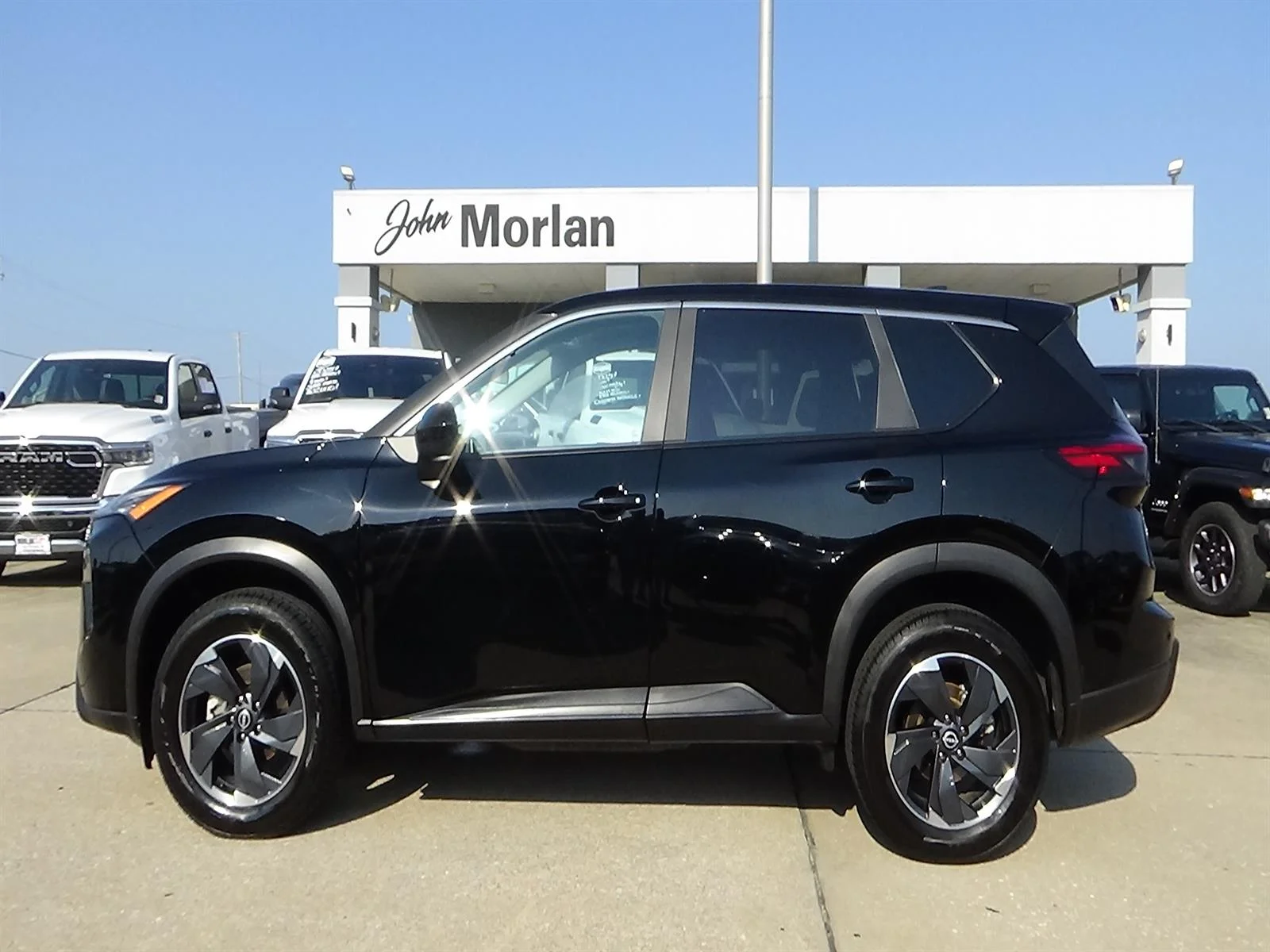 Used 2025 Super Black (kh3) Nissan SV image 1