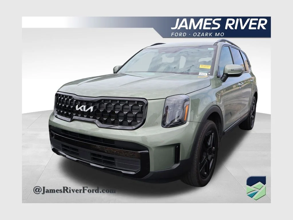 Used 2024 Jungle Green Kia EX X-Line image 1