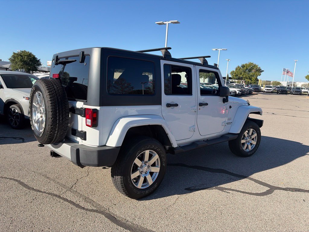 Used 2013 White Jeep Unlimited Sahara image 12