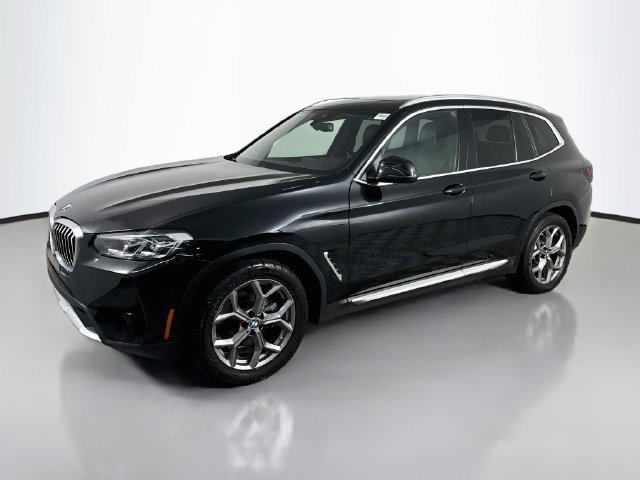 Used 2024 Black Sapphire Metallic BMW sDrive30i image 3