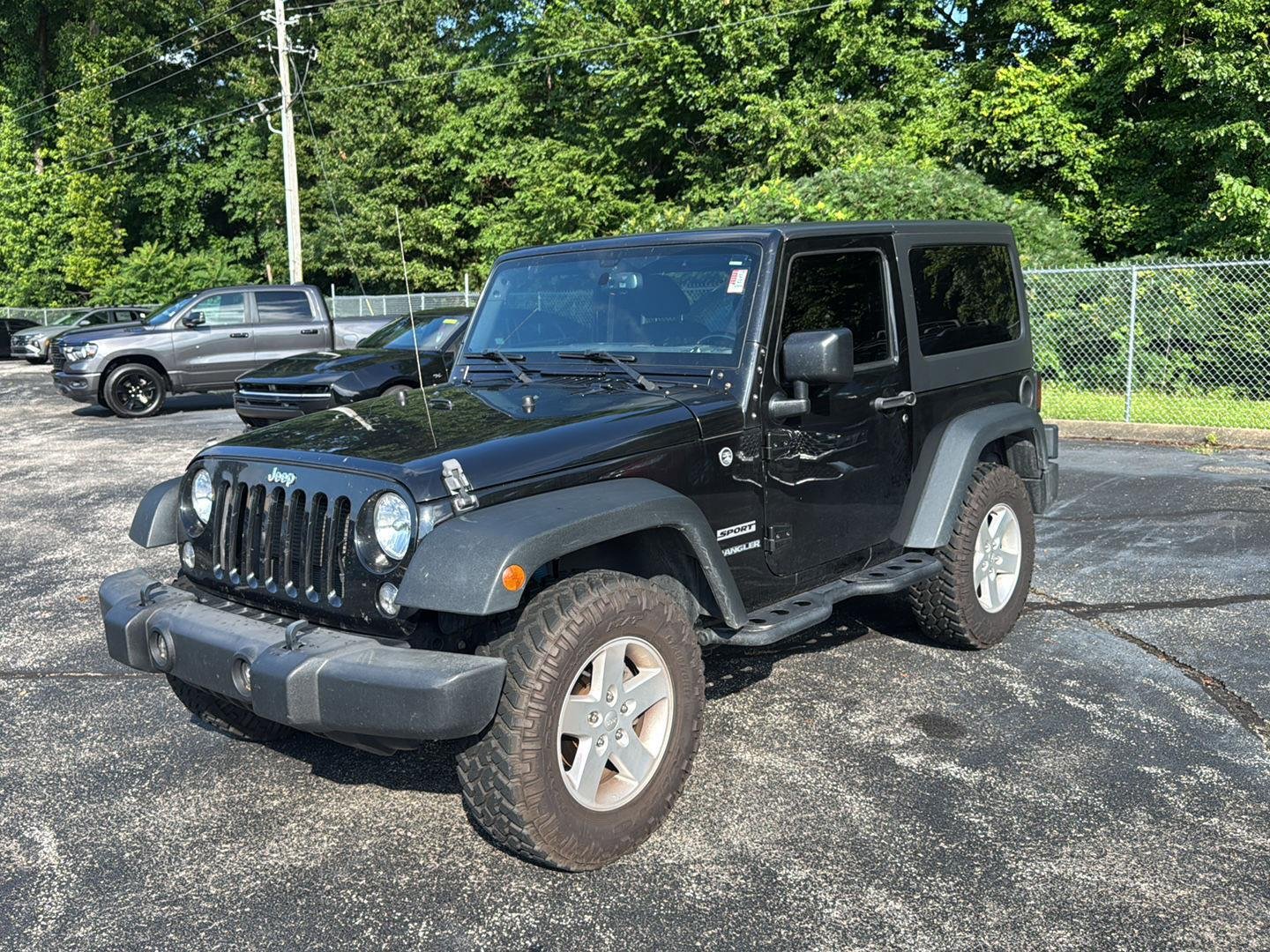 Used 2016 Black Clearcoat Jeep Sport image 7