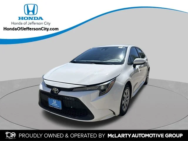 Used 2021 Super White Toyota LE image 1