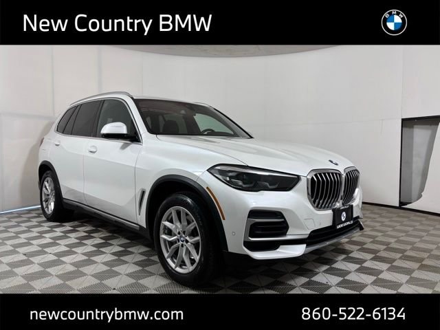 Used 2023 Mineral White Metallic BMW xDrive40i image 1