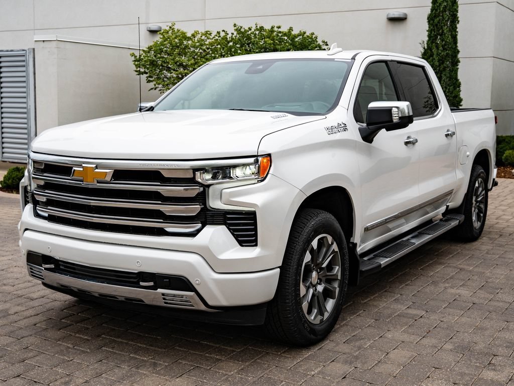 Used 2024 Iridescent Pearl Tricoat Chevrolet High Country image 1