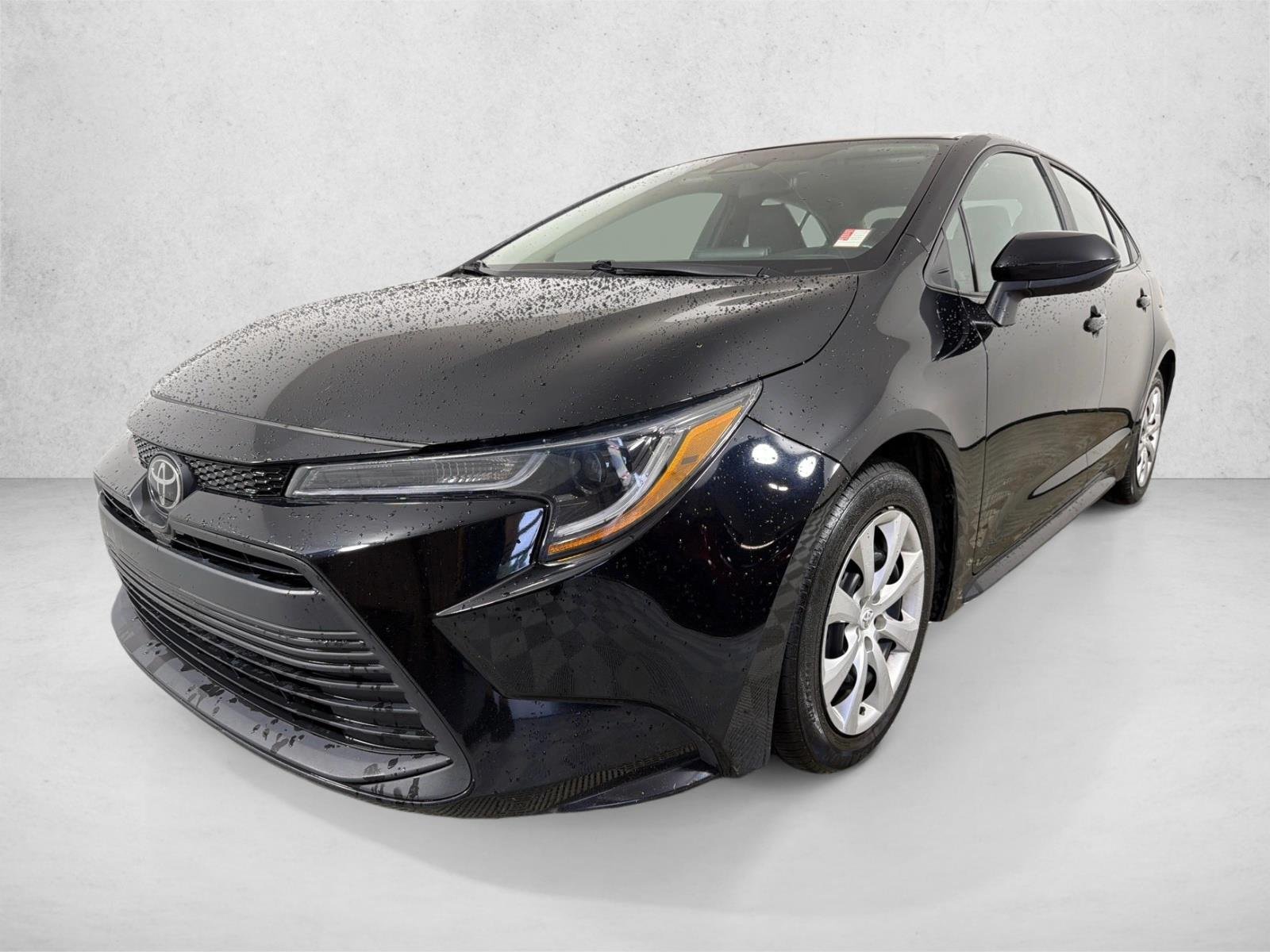Used 2024 Midnight Black Metallic Toyota LE image 7