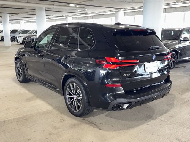 New 2026 Black Sapphire Metallic BMW xDrive50e image 5