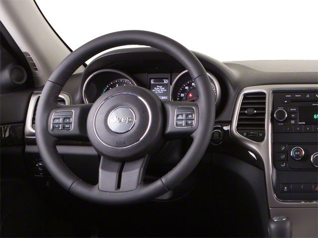 Used 2013 True Blue Pearl Jeep Laredo image 9