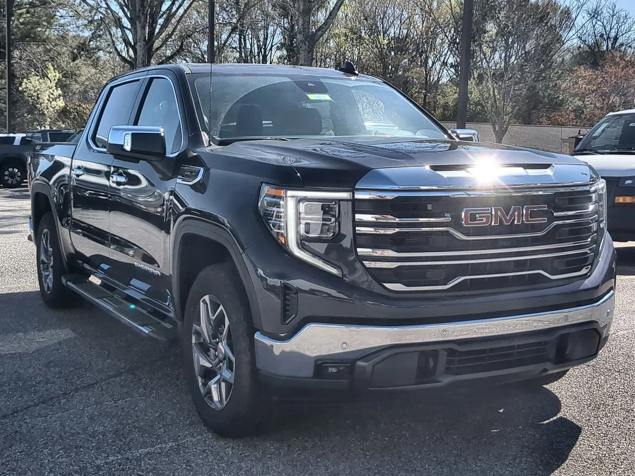 New 2026 TITANIUM RUSH METALLIC GMC SLT image 2