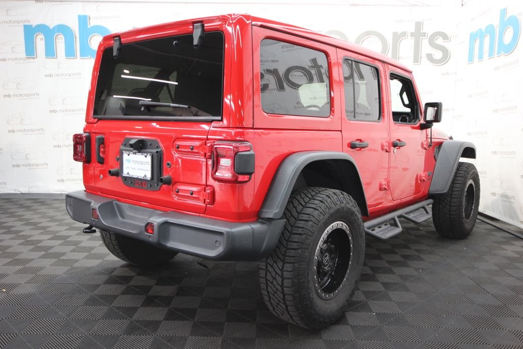 Used 2019 Red Jeep Unlimited Sahara image 7