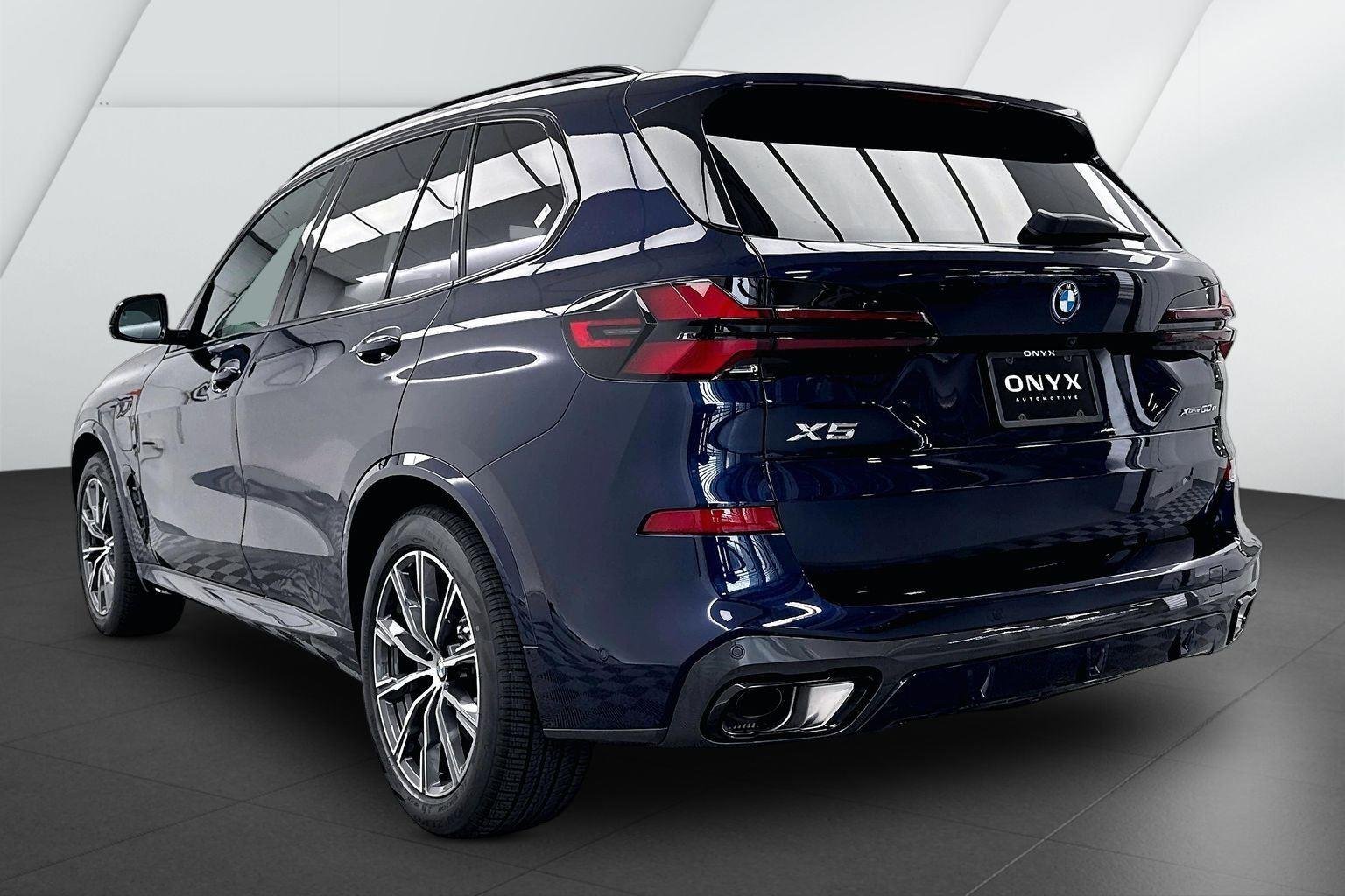 New 2026 Tanzanite Blue II Metallic BMW xDrive50e image 9