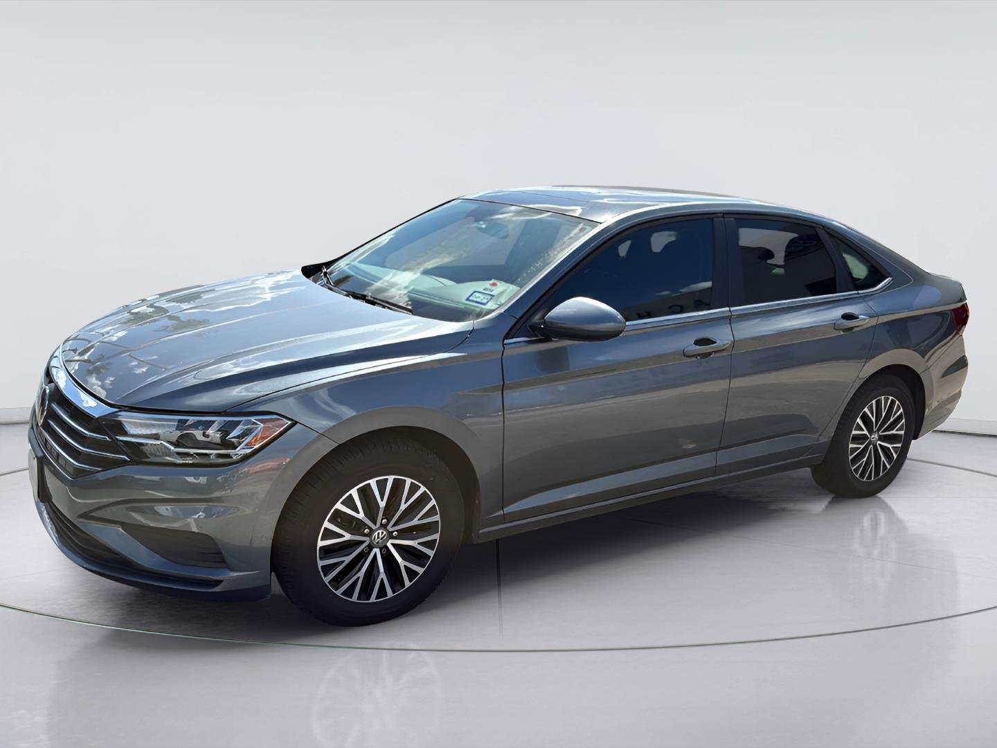 Used 2021 Platinum Gray Metallic Volkswagen SE image 1