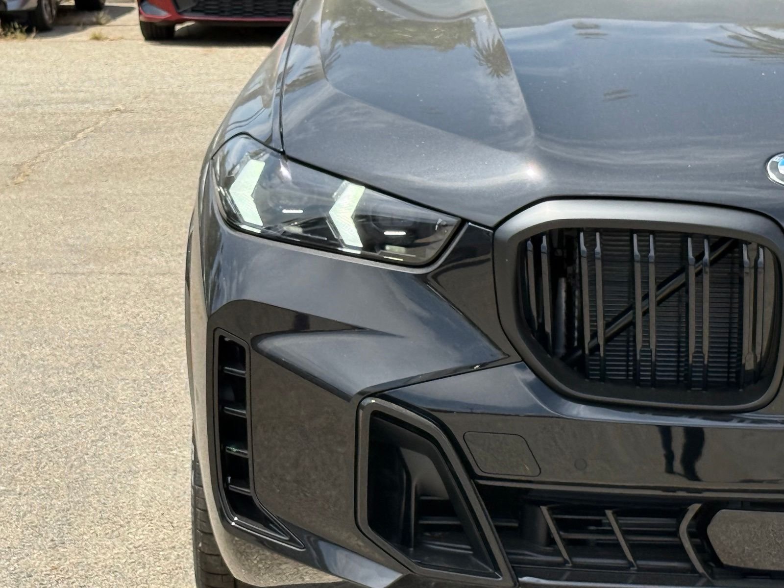 New 2026 Black Sapphire Metallic BMW M60i image 13