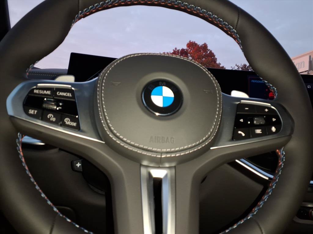 Used 2026 Black Sapphire Metallic BMW M60i image 20