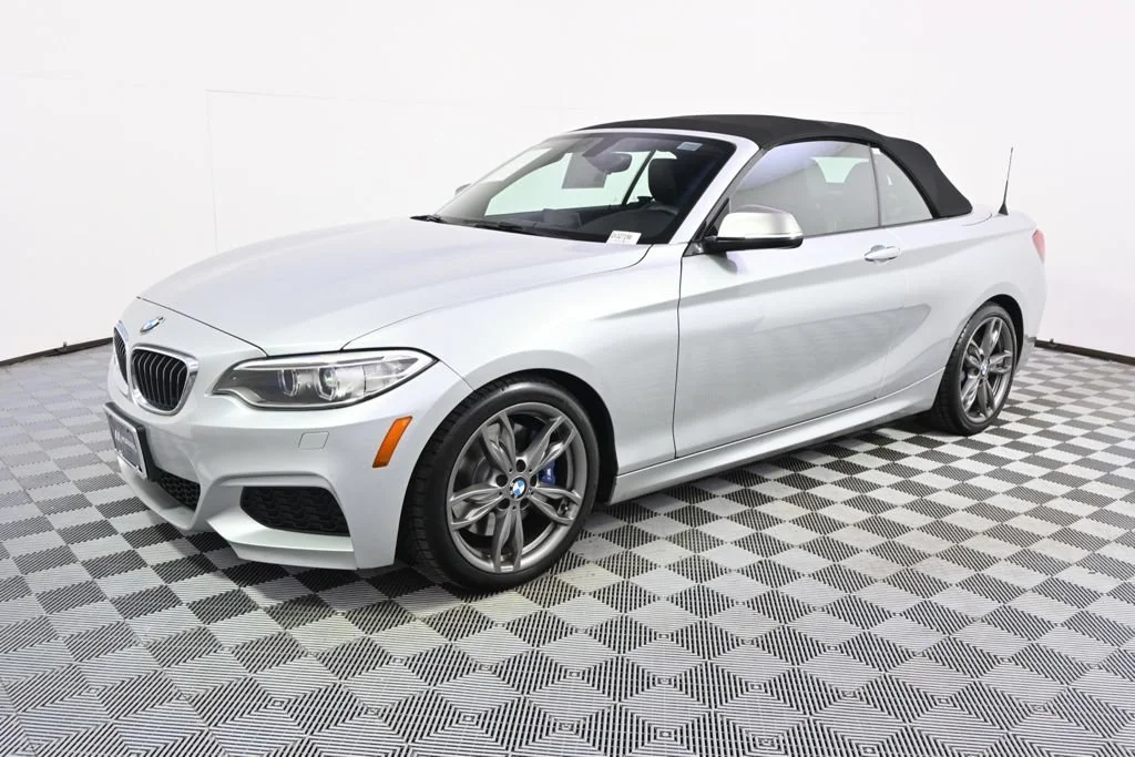 Used 2016 BMW 2 Series M235i with VIN WBA1M5C5XGV327156 for sale in Minneapolis, Minnesota