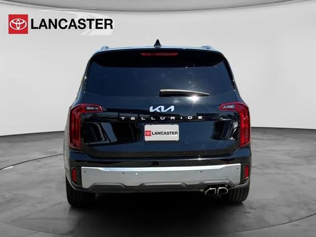 Used 2023 Ebony Black Kia S image 6