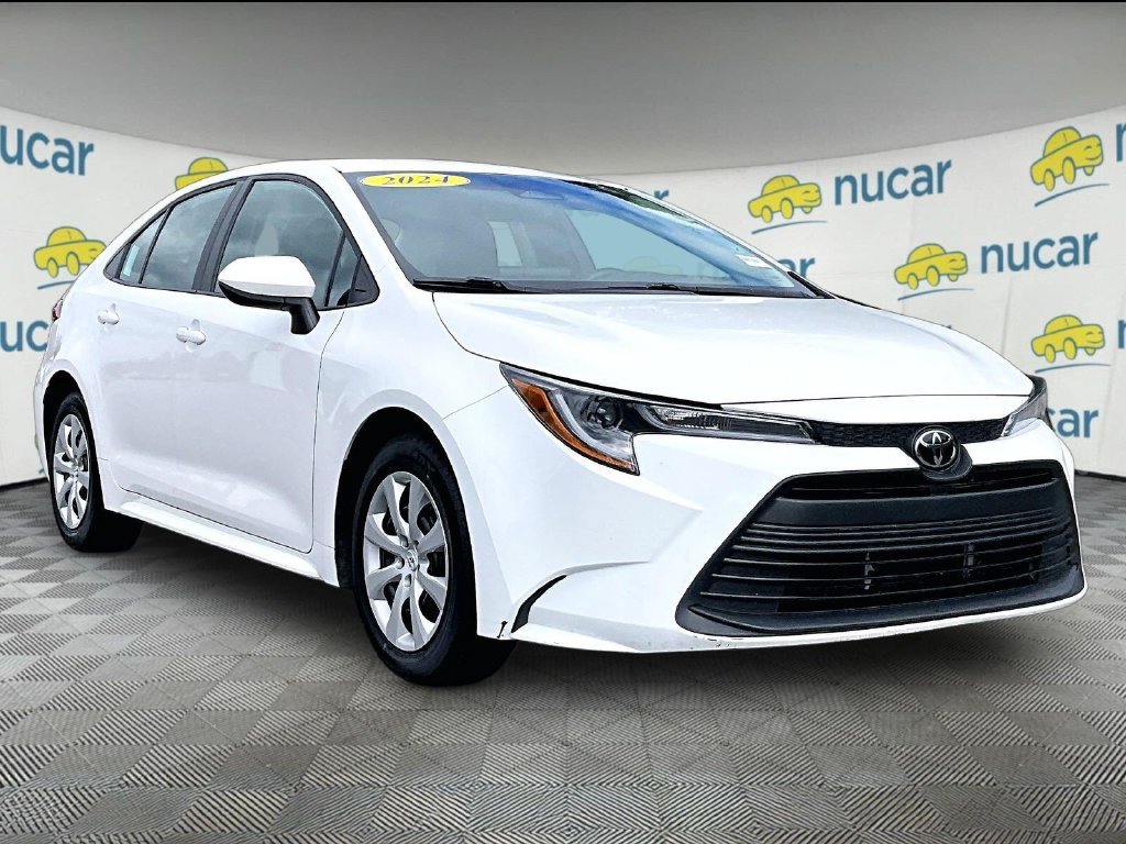 Used 2024 White Toyota LE image 1