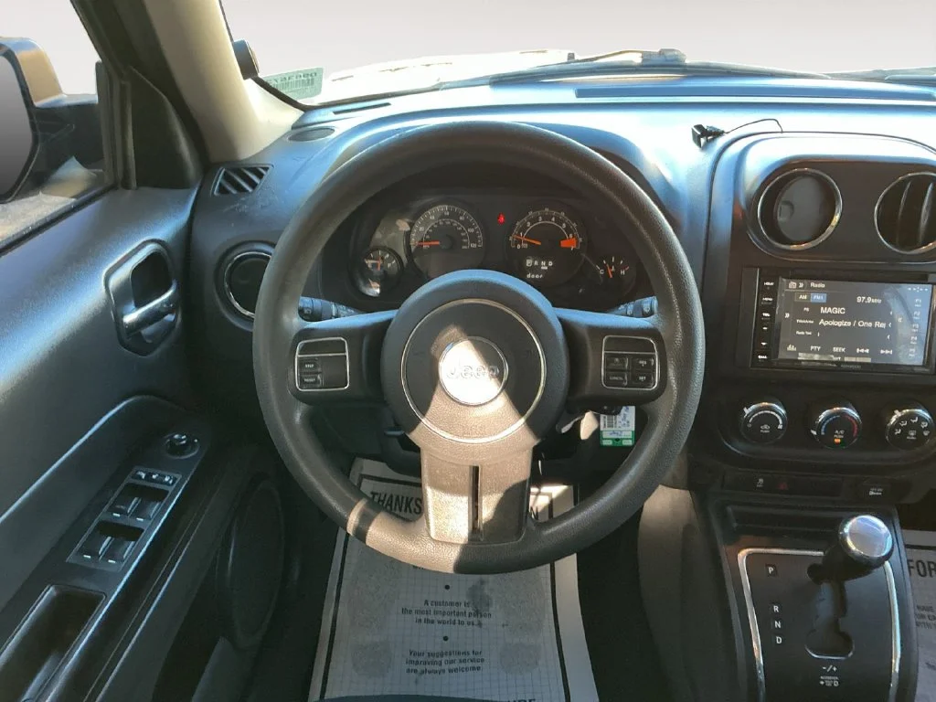 Used 2016 Black Jeep Sport image 12