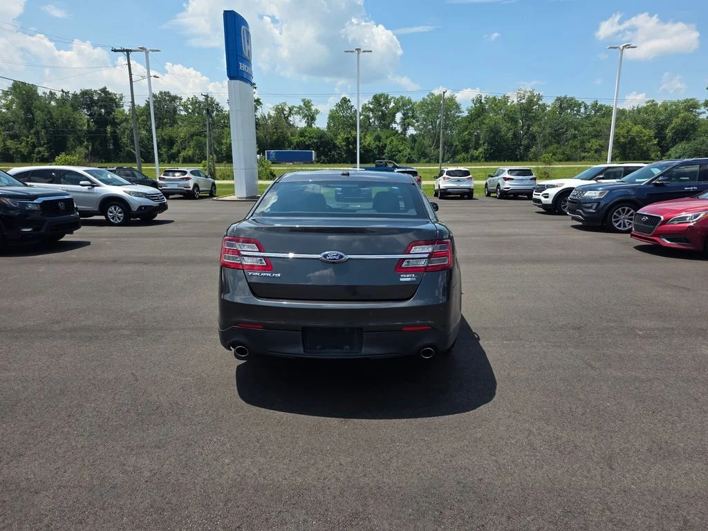 Used 2015 Magnetic Metallic Ford SEL image 4