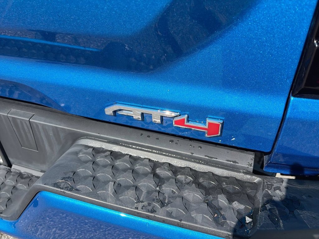 Used 2023 DYNAMIC BLUE METALLIC GMC 4WD AT4 image 8