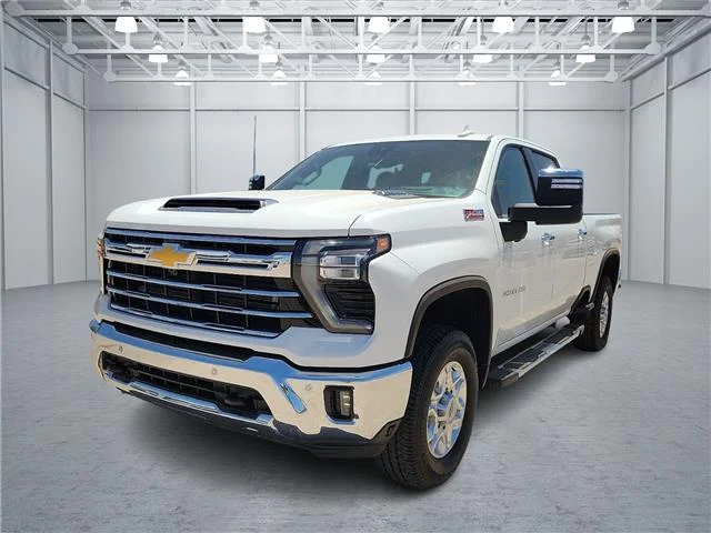 Used 2025 Summit White Chevrolet LTZ 4x4 Crew Cab 8 ft. box 172 in. WB image 1