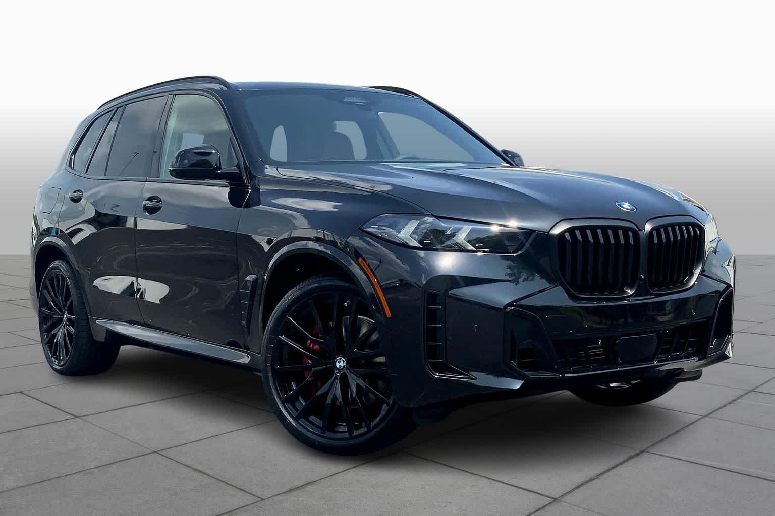 New 2026 Black Sapphire Metallic BMW sDrive40i image 2