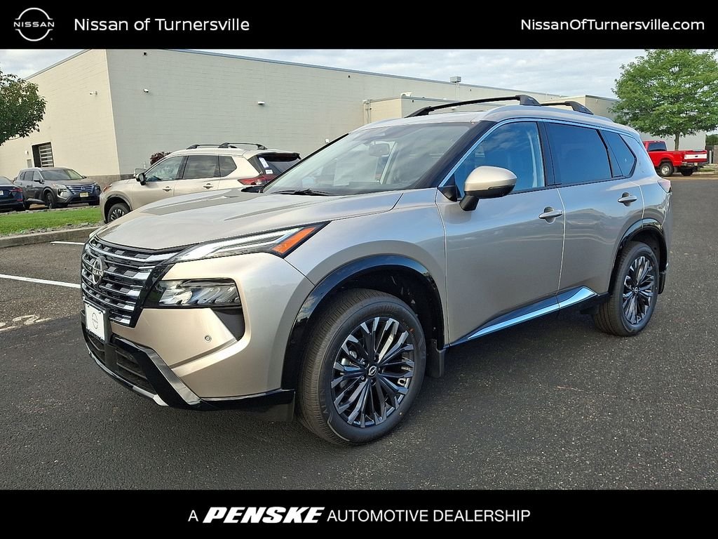 New 2026 Champagne Silver Metallic Nissan Platinum image 1