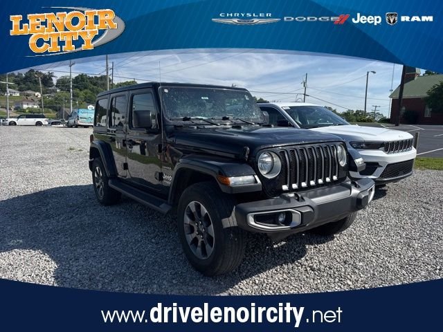 Used 2019 Black Jeep Unlimited Sahara image 1