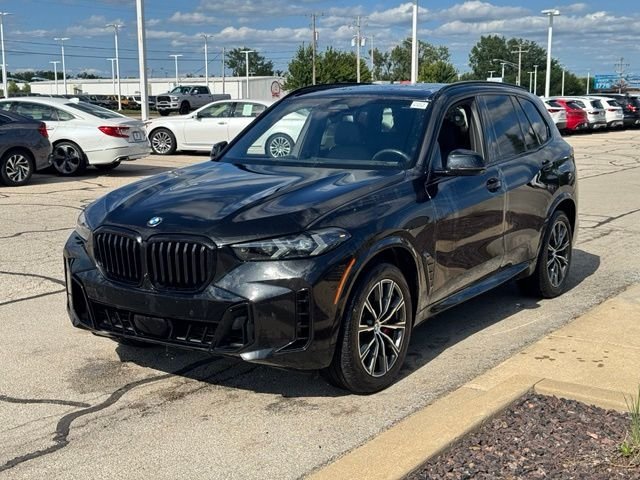 Certified Used 2024 Black Sapphire Metallic BMW xDrive40i image 5