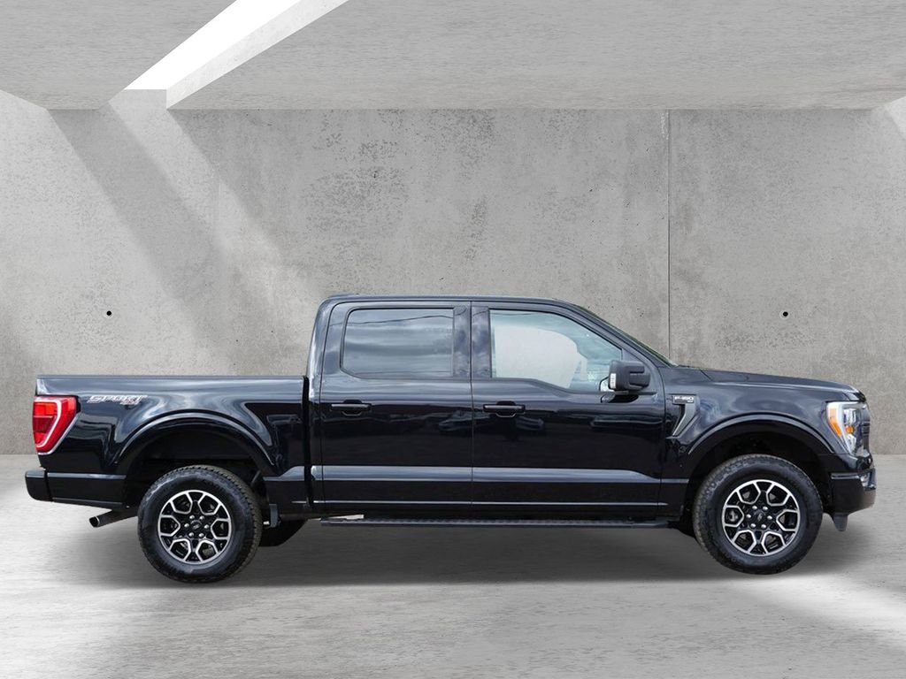 Used 2022 Ford F-150 XLT with VIN 1FTFW1E87NKF13867 for sale in White Bear Lake, Minnesota