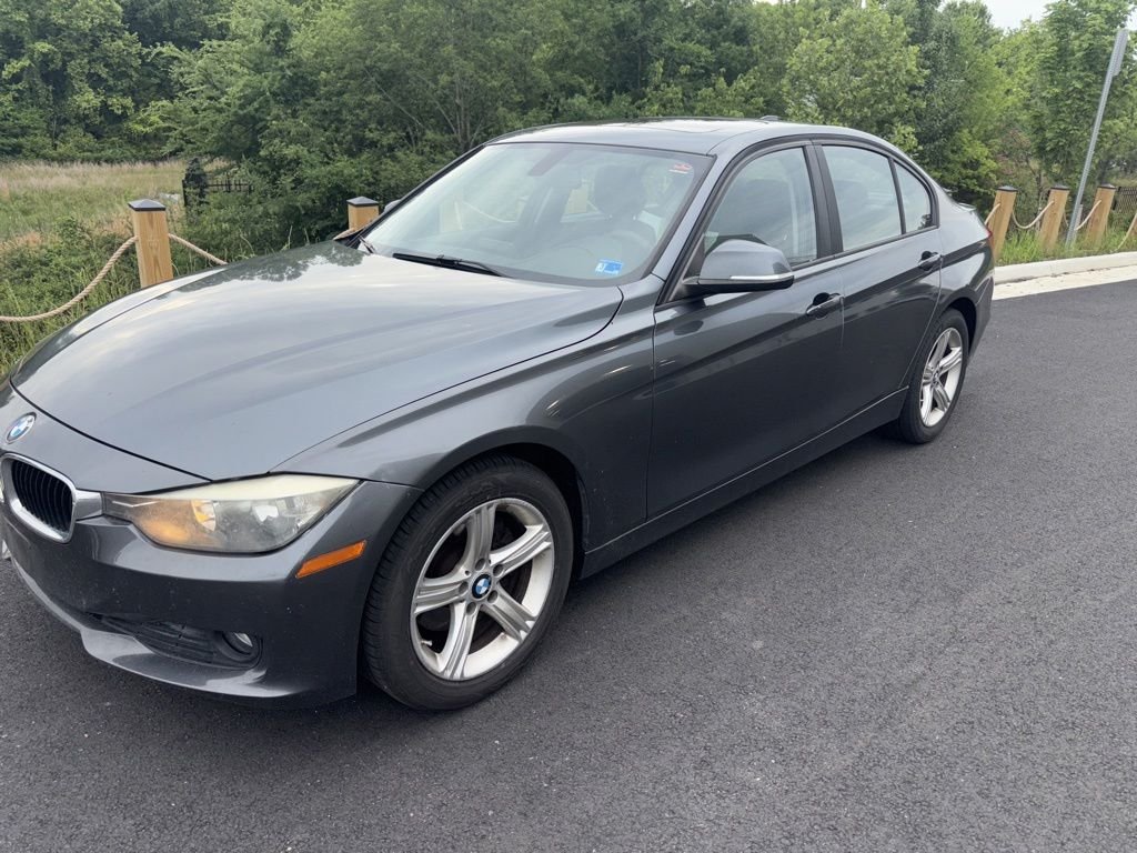 Used 2015 Mineral Gray Metallic BMW 320i image 1