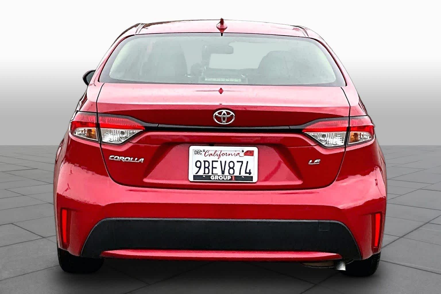 Used 2020 Barcelona Red Metallic Toyota LE image 4