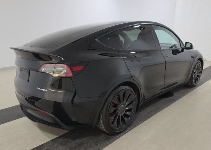 Used 2023 Tesla Model Y Performance with VIN 7SAYGDEF7PF831044 for sale in Naples, FL