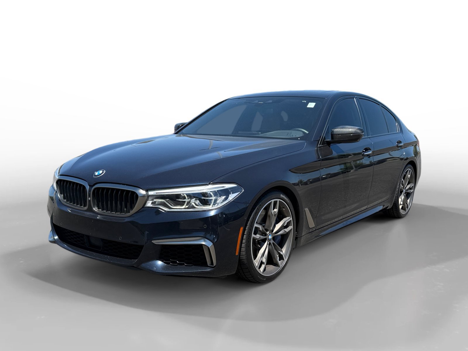 Used 2018 Carbon Black Metallic BMW M550i xDrive image 1