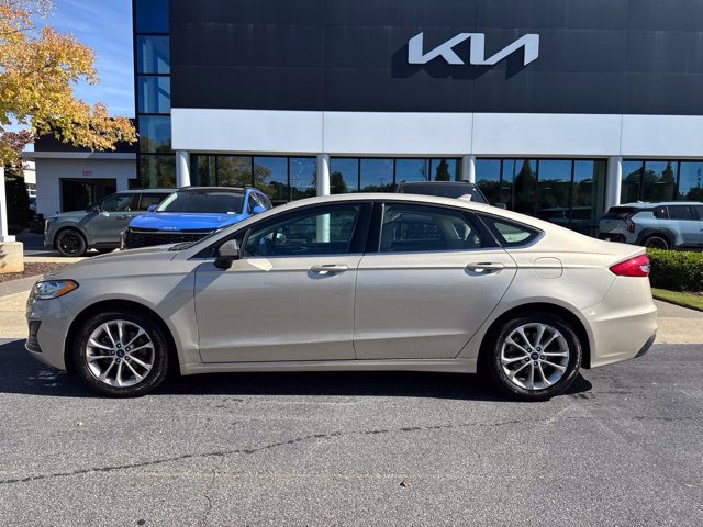 Used 2019 Gold Ford SE image 2