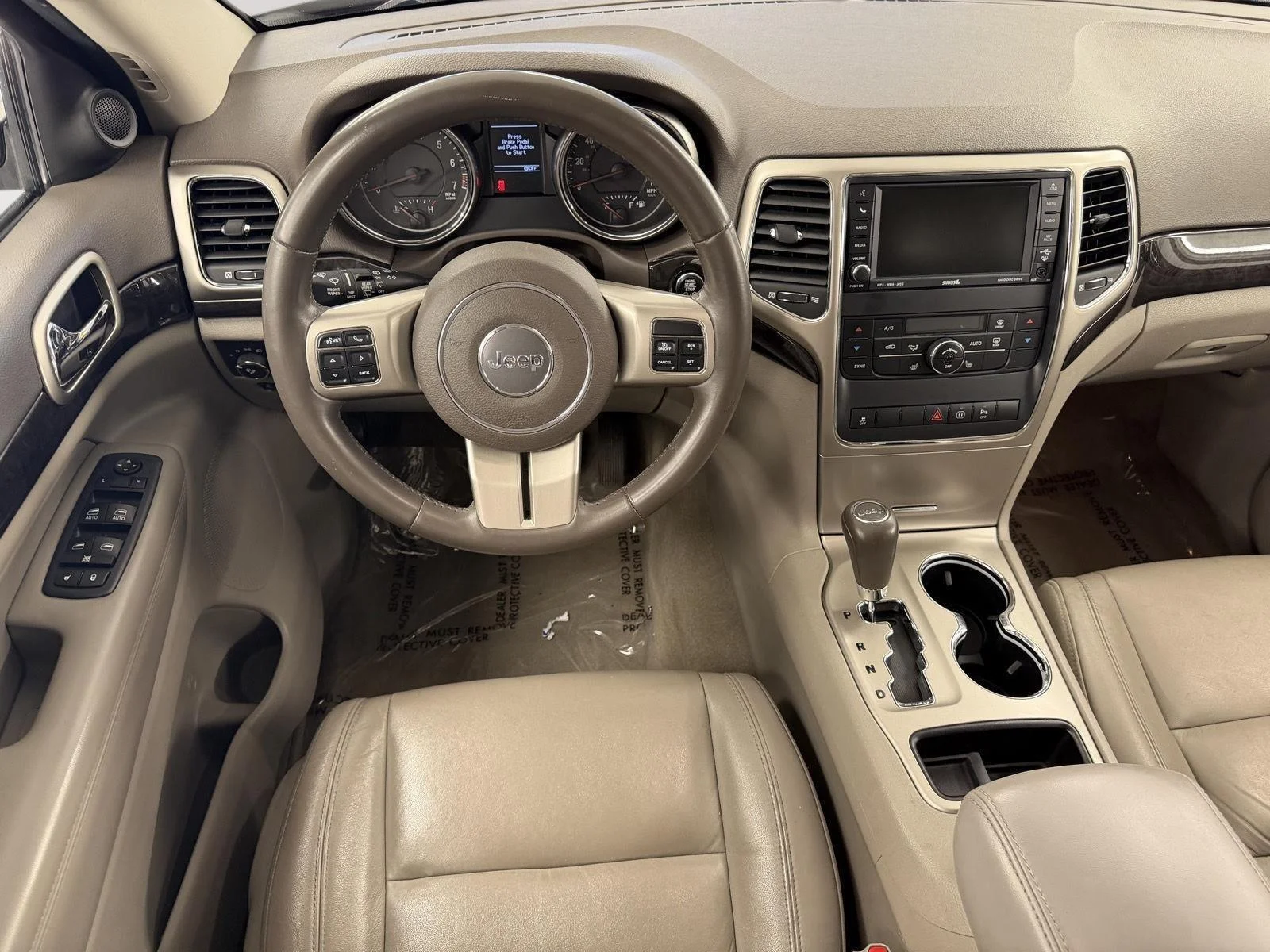 Used 2011 Dark Charcoal Pearl Jeep Laredo image 24
