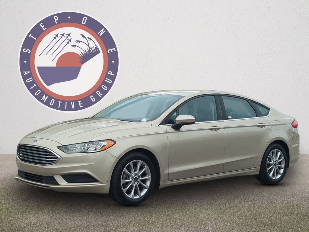 Used 2017 Gold Ford SE image 1