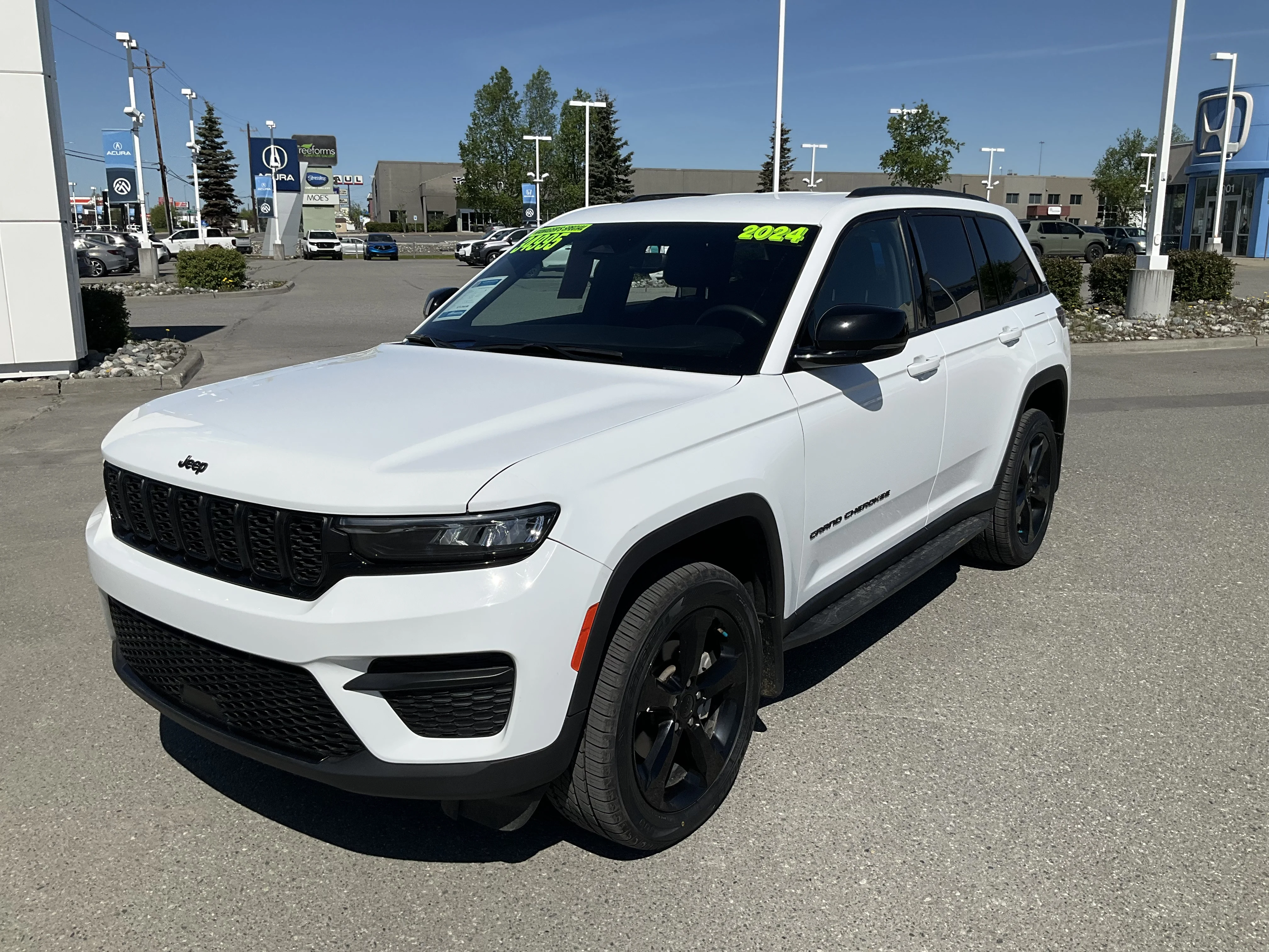 Used 2024 Bright White Jeep Altitude image 1