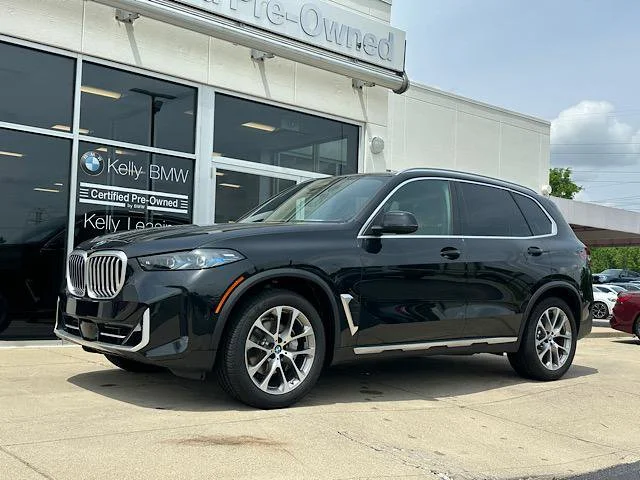 Certified Used 2024 Black Sapphire Metallic BMW xDrive40i image 4