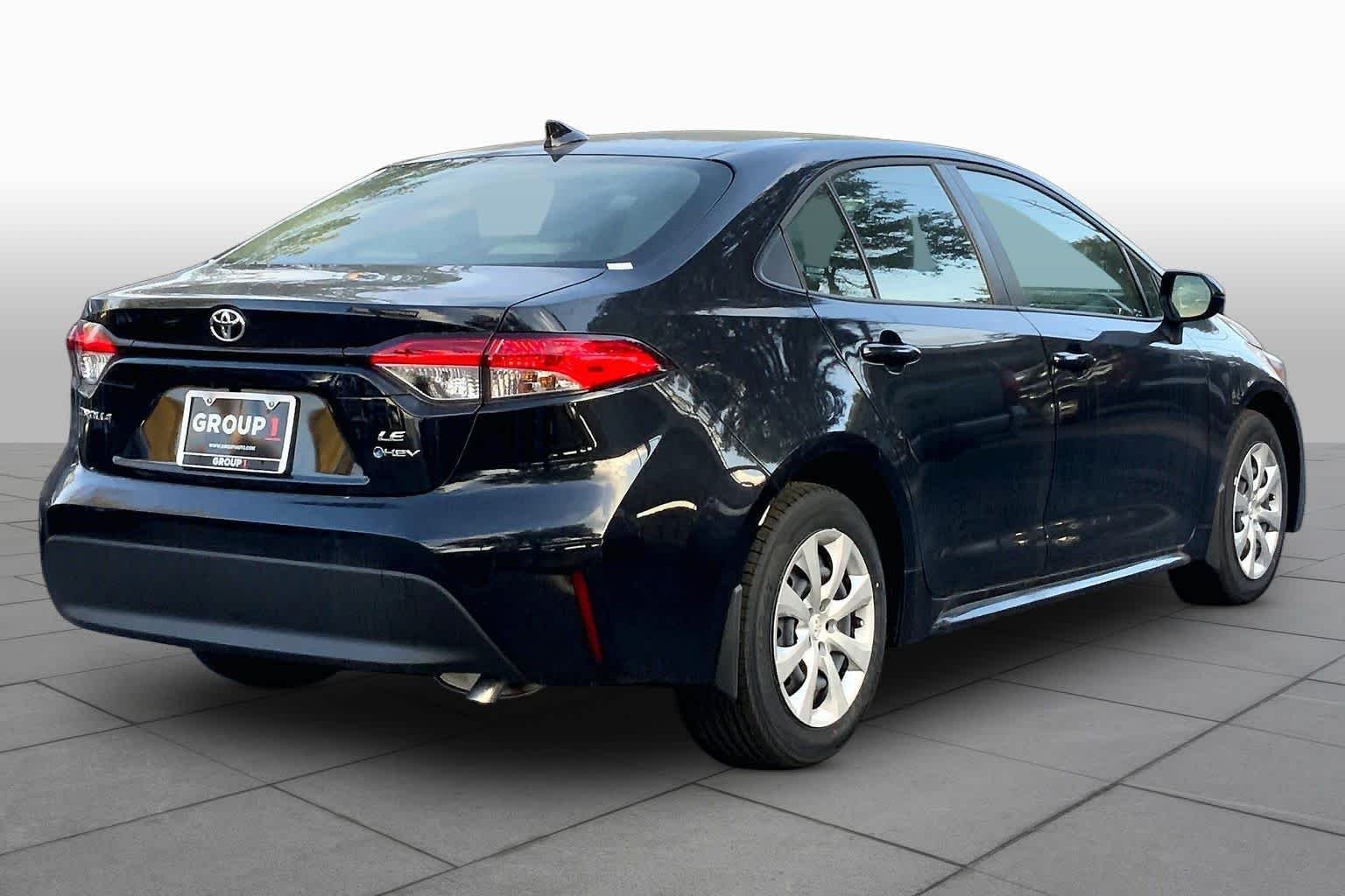Used 2026 Midnight Black Metallic Toyota Hybrid LE image 12