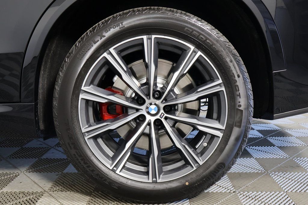 New 2026 Black Sapphire Metallic BMW xDrive50e image 10