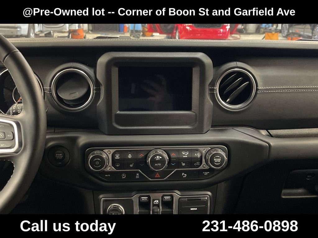 Used 2018 Orange Jeep Unlimited Sahara image 19