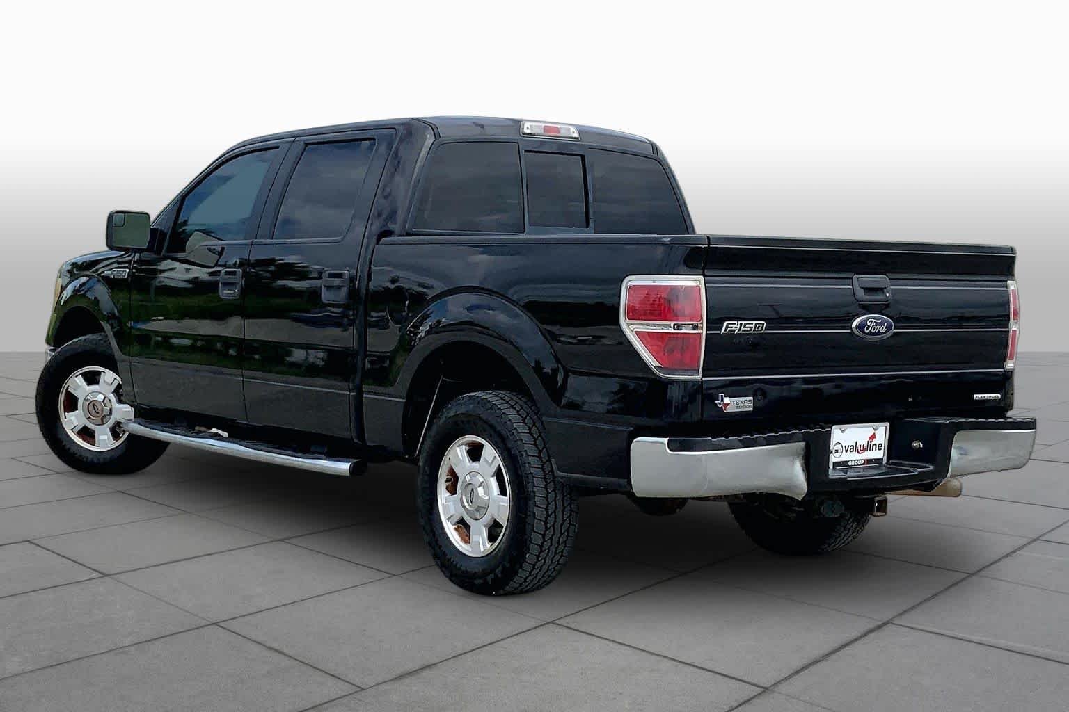 Used 2013 Tuxedo Black Metallic Ford XLT image 12