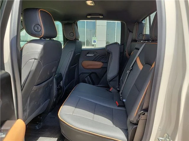 Used 2026 Tan GMC AT4 4x4 Crew Cab 5 ft. box 131 in. WB image 7