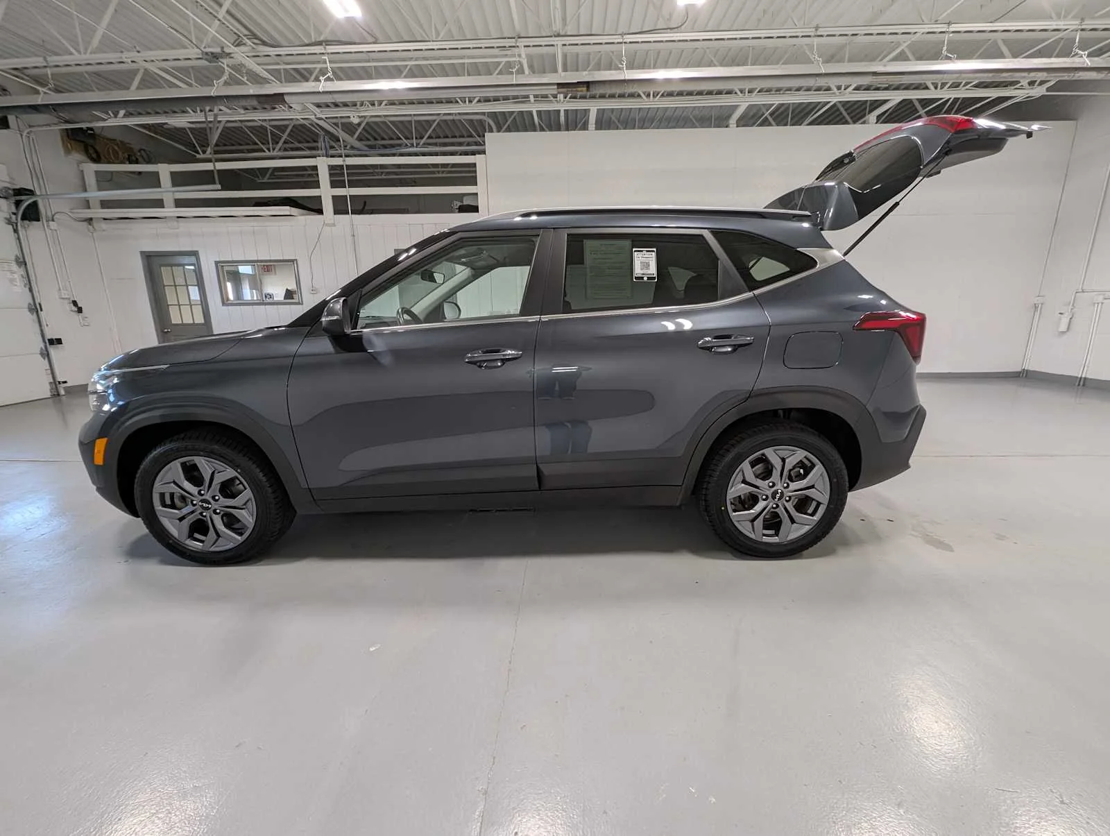 Used 2024 Gravity Gray Kia S image 12