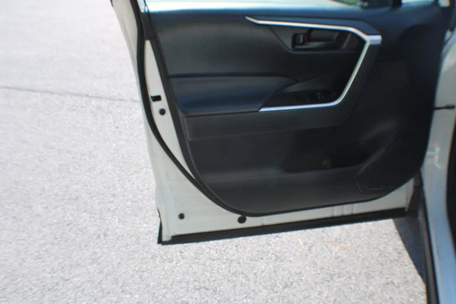 Used 2021 Super White Toyota LE image 6