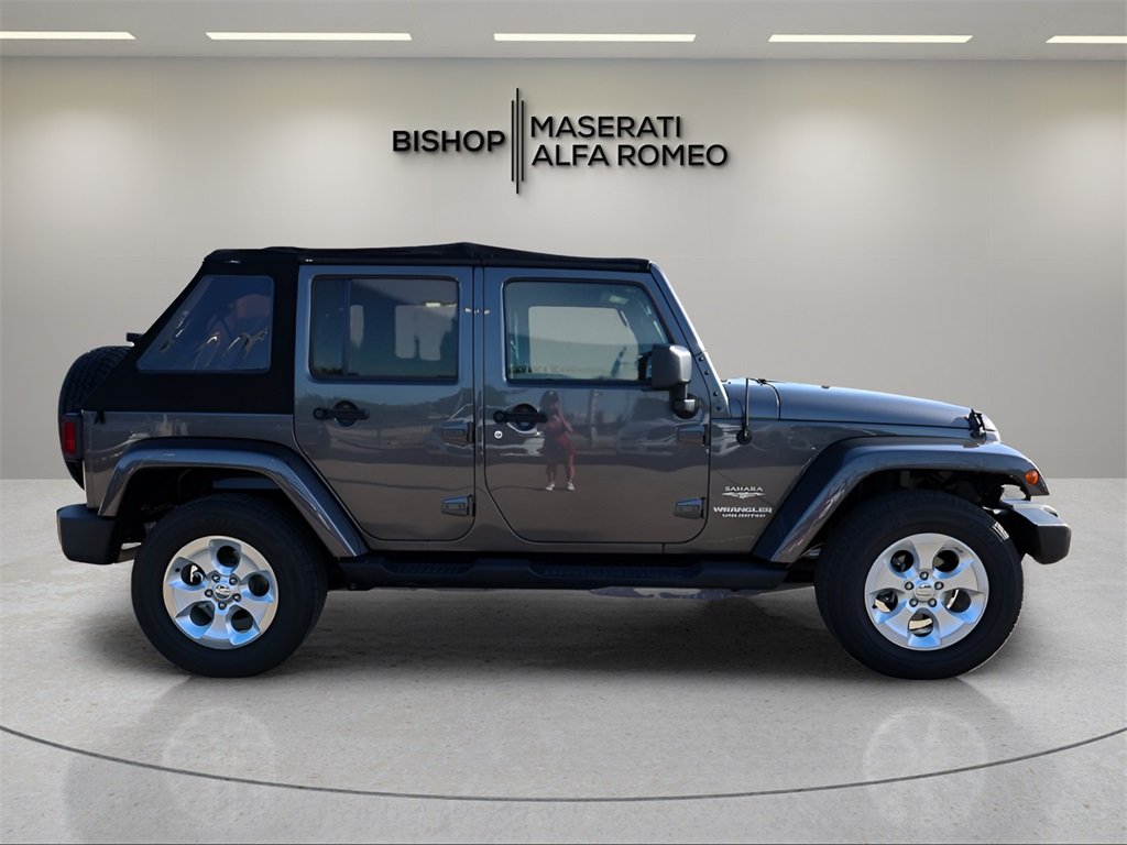 Used 2014 Jeep Wrangler Unlimited Sahara with VIN 1C4BJWEGXEL185176 for sale in Hurst, TX